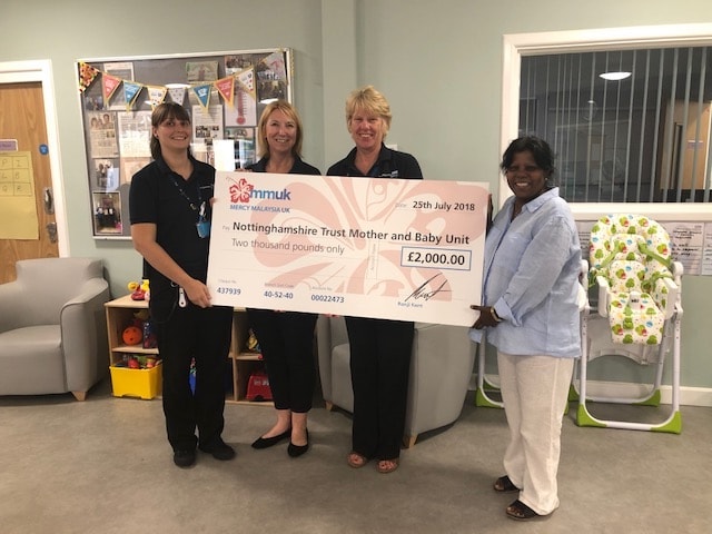 Presenting a cheque for funds raised in collaboration with Mercy Malaysia Uk for the Nottinghamshire Trust Mother and Baby Unit Sensory Room
